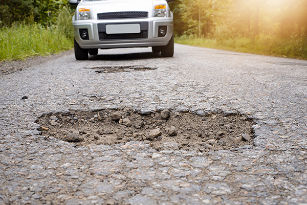 Why Do Potholes Get Worse After the Cold Months? | Westside Car Care